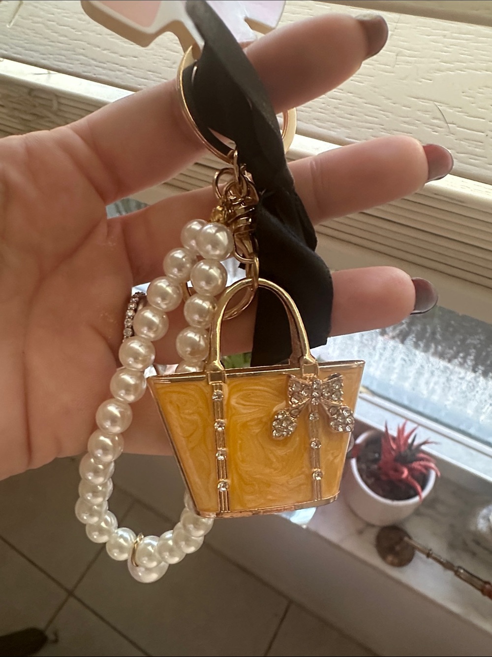Yellow Handbag Keychain with Pearl-Accent and Black Bow - Picture 3 of 5